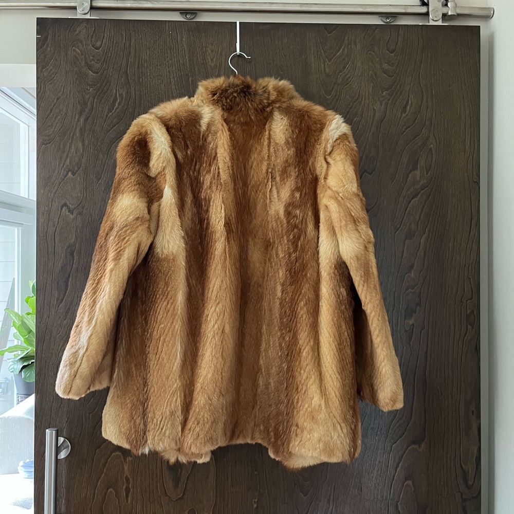 Simply Gorgeous Fur Coat. This Beauty can be dressed up or down.